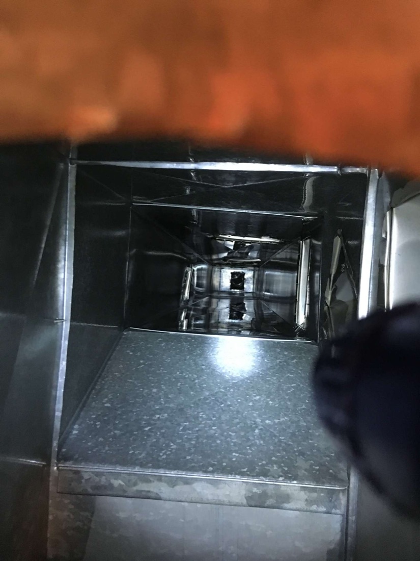 The same residential air duct clean after dust and cobweb removal